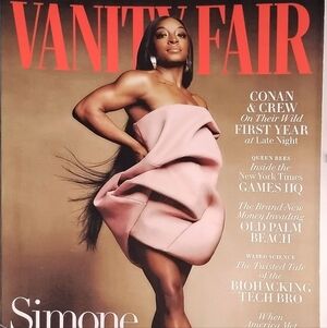 Vanity Fair Magazine Cover featuring Pink Dress and Red Masthead